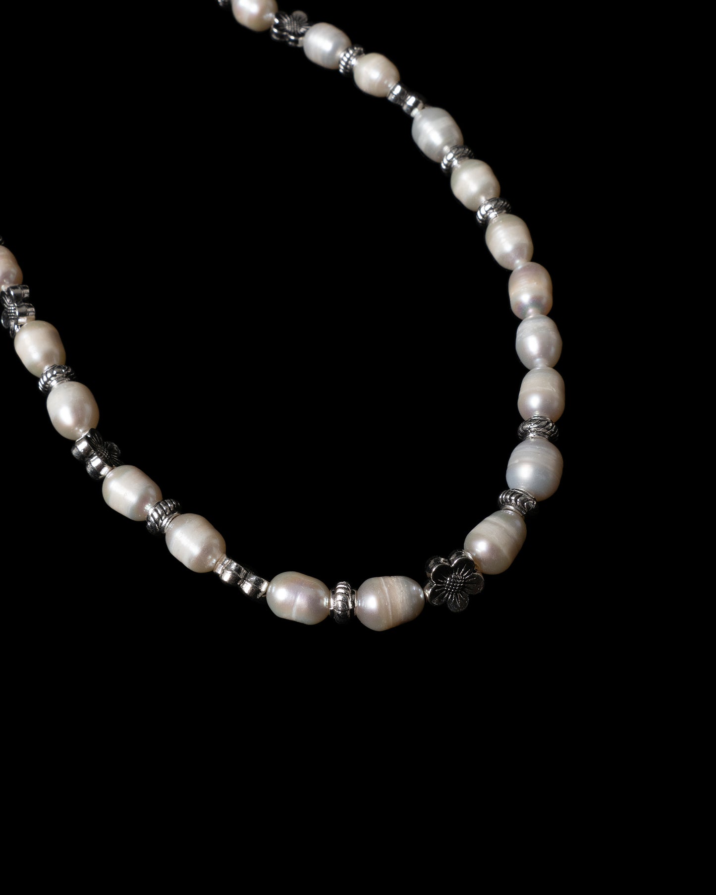 Family crest pearl necklace